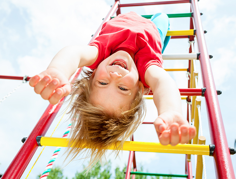 child playing on a playground