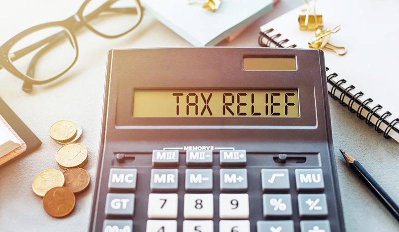 Tax Relief written on a Calculator