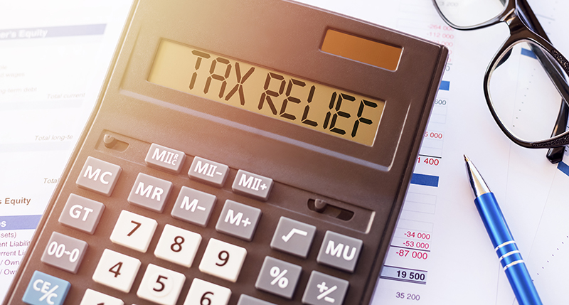 Tax Relief written on a Calculator