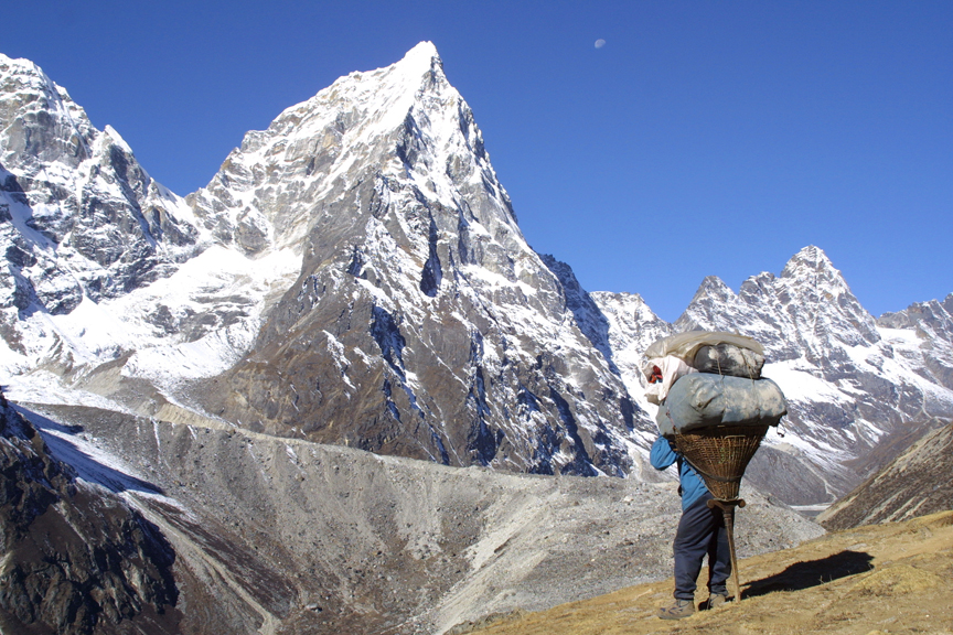 Person backpacking in mountains