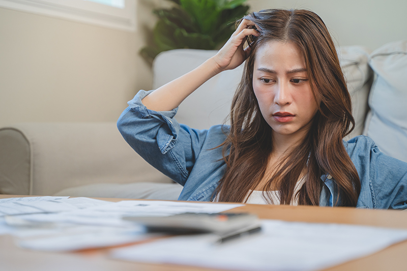 Woman looking at paperwork