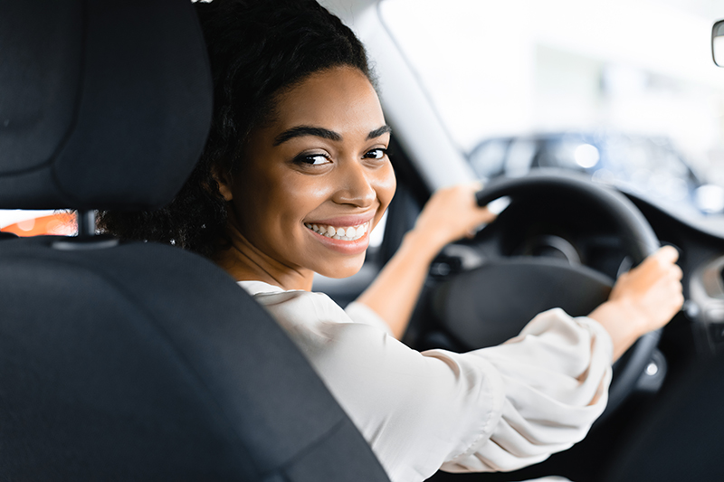 Woman Driving New Car