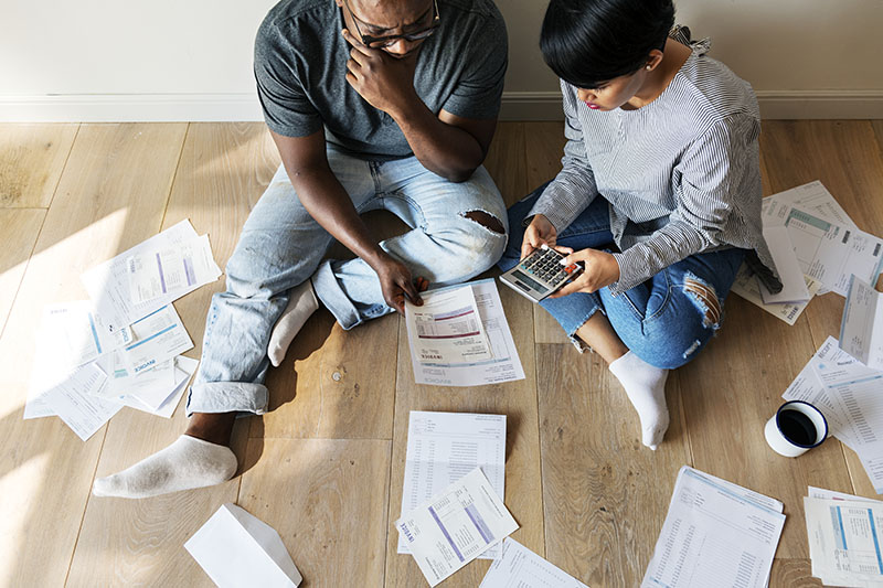 Couple looking at financial paperwork