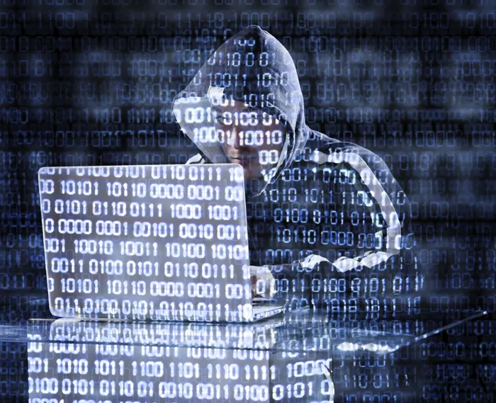 Person on computer attempting ID theft