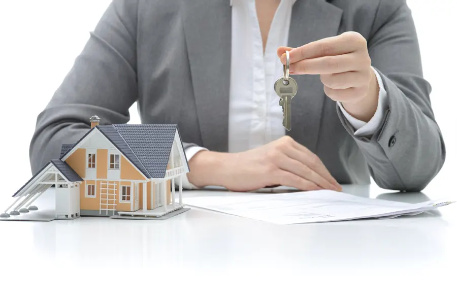 Woman holding house keys