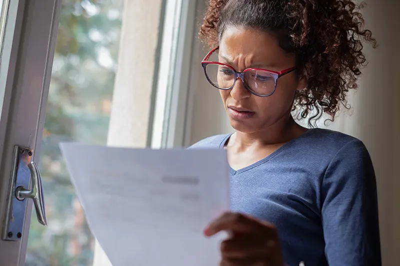 Woman reading CP2000 letter from the IRS