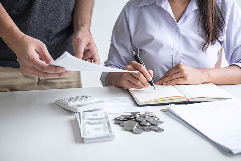 Money and paperwork on a desk