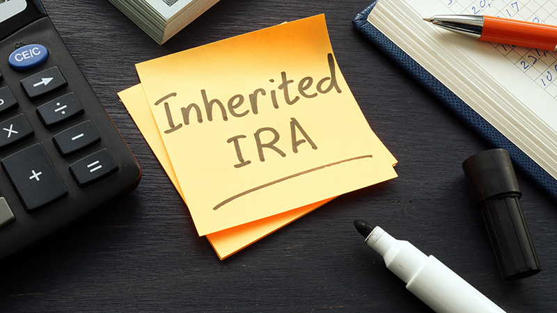 Inherited IRA written on a sticky note