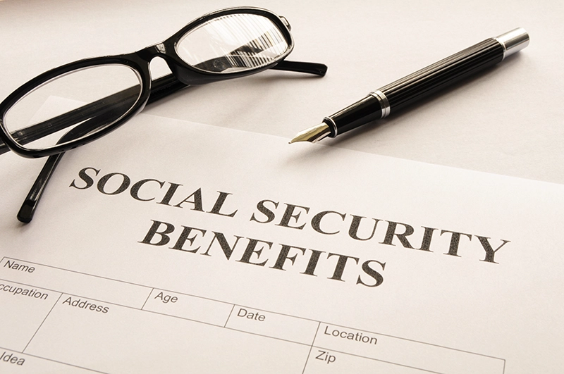 Social Security Benefits Written on Paper