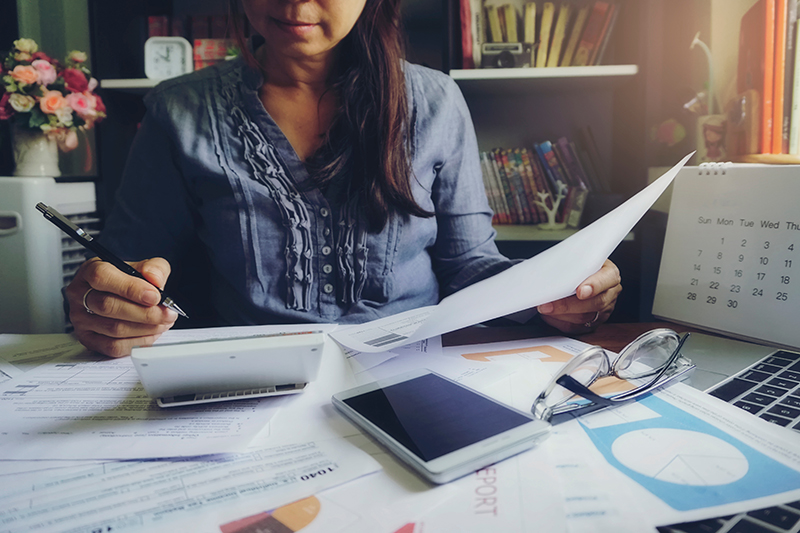 Woman looking at paperwork